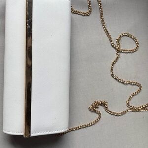 Source Unknown White Clutch with Gold Chain and Trim Accent